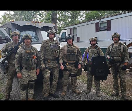 Matt Roberts with members of the Howell County SWAT Team