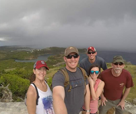 Matt Roberts hiking with his family