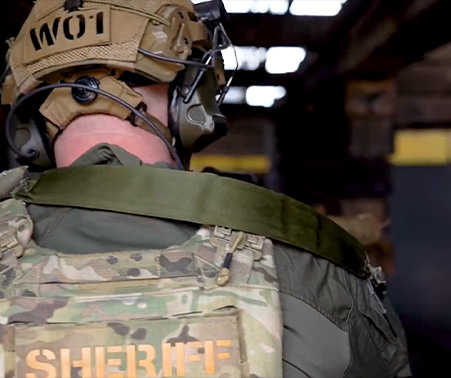 Matt Roberts clearing a building in tactical gear